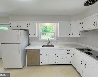 10001 Woodhill Road - Photo Thumbnail 4