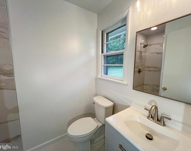 10001 Woodhill Road - Photo Thumbnail 22