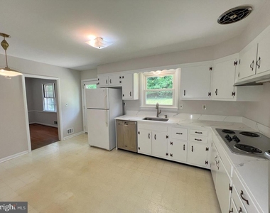 10001 Woodhill Road - Photo Thumbnail 5