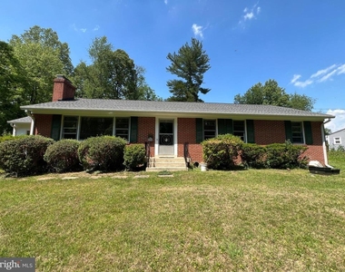 10001 Woodhill Road - Photo Thumbnail 2