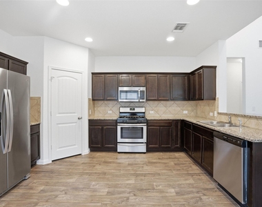 3009 Tilmon Ln - Photo Thumbnail 4