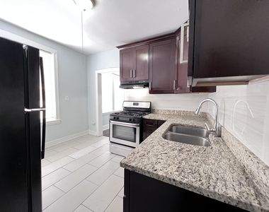 8856 S Lowe Avenue - Photo Thumbnail 8