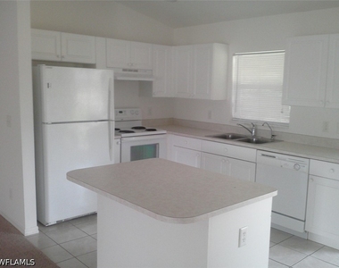 1407 W 10th Street - Photo Thumbnail 3