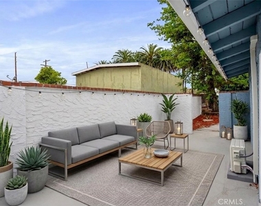 1514 1/2 E Young Street - Photo Thumbnail 3