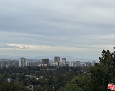 9920 Beverly Grove Drive - Photo Thumbnail 2