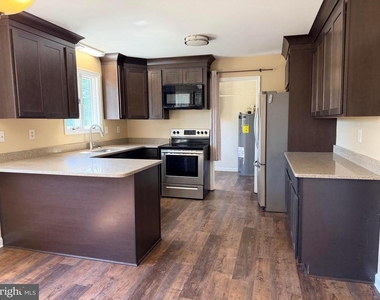 1122 Nevins Place - Photo Thumbnail 7