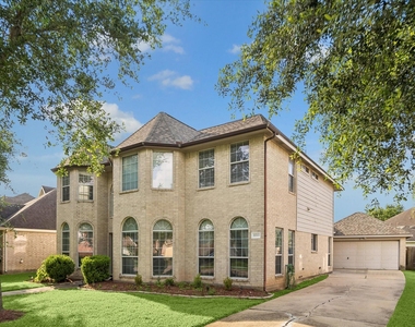 21702 Cozy Hollow Lane - Photo Thumbnail 1