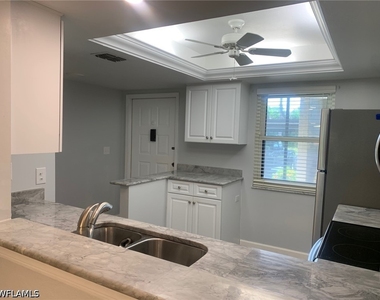 8715 Charter Club Circle - Photo Thumbnail 3