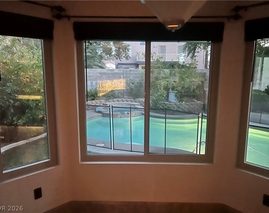 8225 Woodland Prairie Avenue - Photo Thumbnail 9