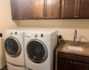 8225 Woodland Prairie Avenue - Photo Thumbnail 27