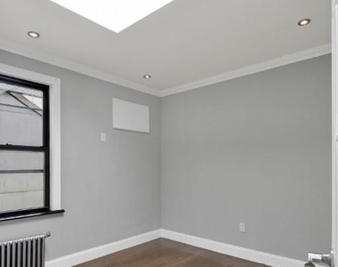 East 26th Street - Photo Thumbnail 1