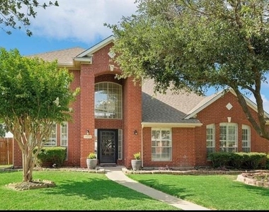 11604 Woodland Way - Photo Thumbnail 2