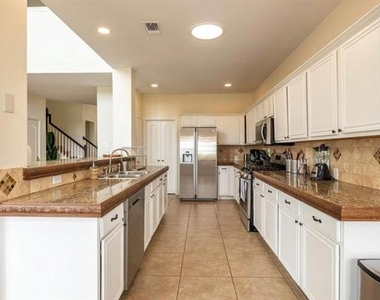 11604 Woodland Way - Photo Thumbnail 11