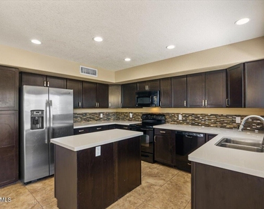 5709 E Gelding Drive - Photo Thumbnail 1