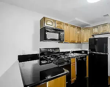 212 East 10th Street - Photo Thumbnail 2