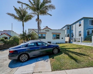 1329 S Tremaine Avenue - Photo Thumbnail 2