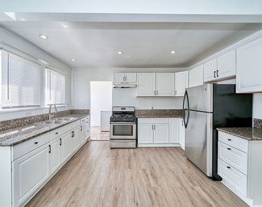 1329 S Tremaine Avenue - Photo Thumbnail 11