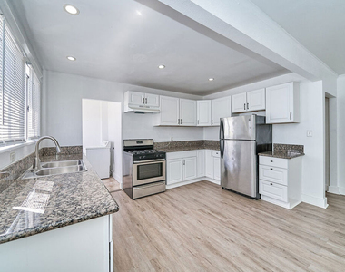 1329 S Tremaine Avenue - Photo Thumbnail 12