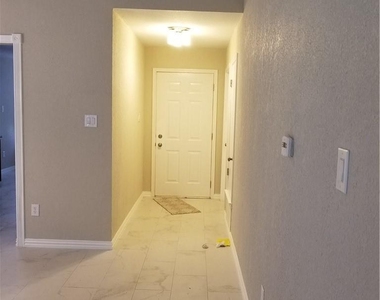 11601 Hidden Quail Dr - Photo Thumbnail 2