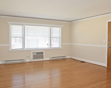 5029 N East River Road - Photo Thumbnail 2