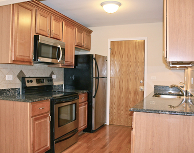 5029 N East River Road - Photo Thumbnail 7