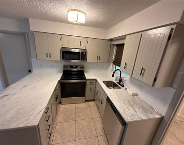 1706 Ne 4th Street - Photo Thumbnail 3