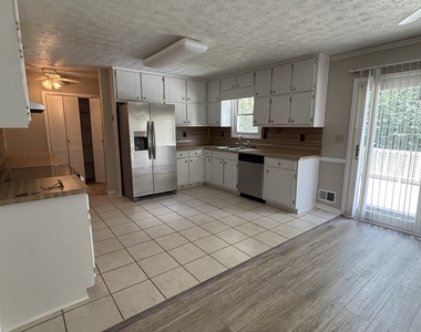 6683 Homestead Road - Photo Thumbnail 2