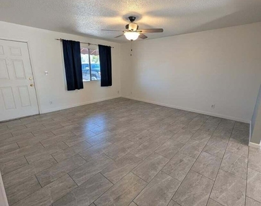 1711 S Hardy Drive - Photo Thumbnail 3