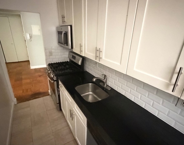 83-33 118th Street - Photo Thumbnail 4