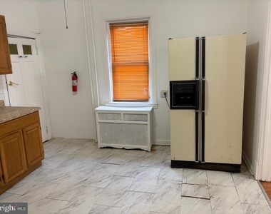 7058 Saybrook Avenue - Photo Thumbnail 9