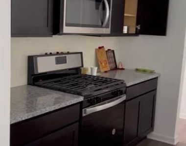 6050 Sanford Place N - Photo Thumbnail 5
