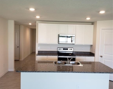 12211 Kingsley Trail - Photo Thumbnail 10