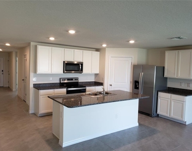 12211 Kingsley Trail - Photo Thumbnail 7