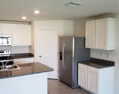 12211 Kingsley Trail - Photo Thumbnail 9