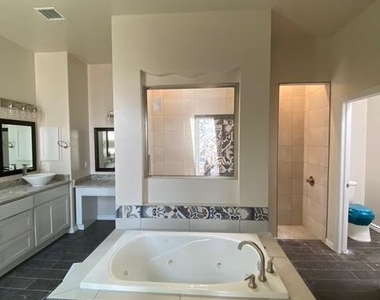 7434 Sidewinder Bend Drive - Photo Thumbnail 16