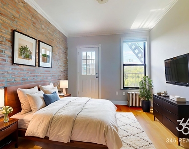 309 East 8th Street - Photo Thumbnail 2