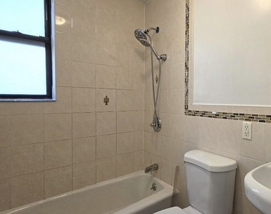 61-40 Saunders St - Photo Thumbnail 2