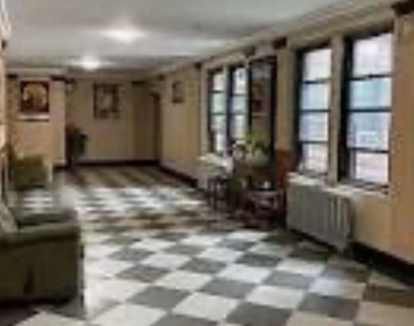 61-40 Saunders St - Photo Thumbnail 4
