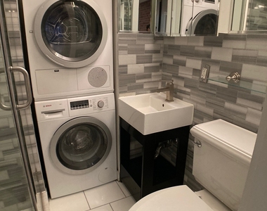 W 52nd St. - Photo Thumbnail 5