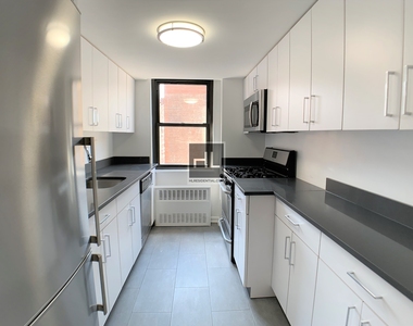 E 16 St - Photo Thumbnail 3