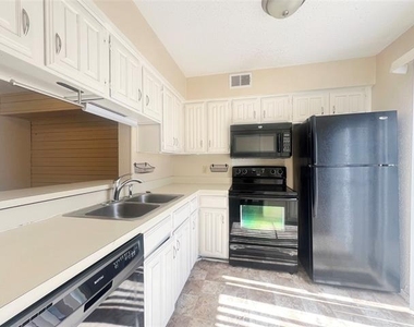 5626 Preston Oaks Road - Photo Thumbnail 2
