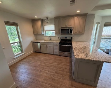 4909 Van Ness Street - Photo Thumbnail 4