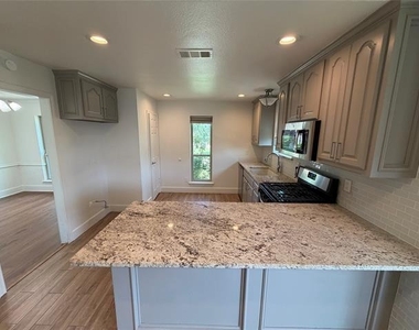 4909 Van Ness Street - Photo Thumbnail 5