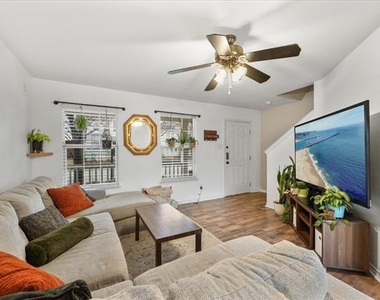 6913 Planters Row Drive - Photo Thumbnail 5