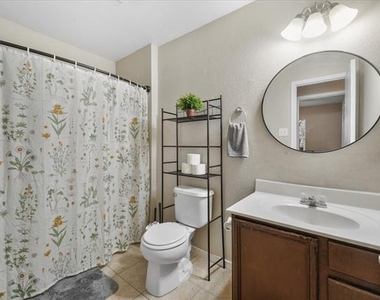 6913 Planters Row Drive - Photo Thumbnail 14