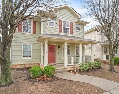 6913 Planters Row Drive - Photo Thumbnail 1