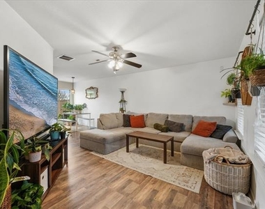 6913 Planters Row Drive - Photo Thumbnail 4