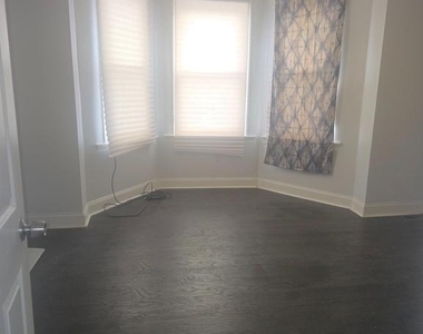 5538 Delancey Street - Photo Thumbnail 7