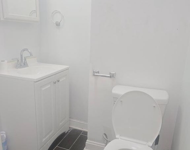 5538 Delancey Street - Photo Thumbnail 6