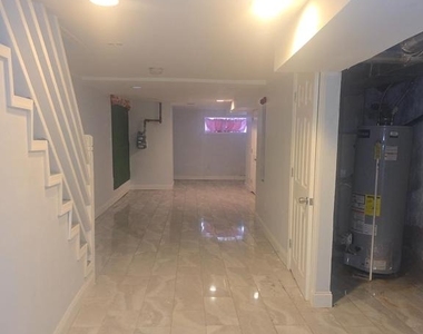 5538 Delancey Street - Photo Thumbnail 4